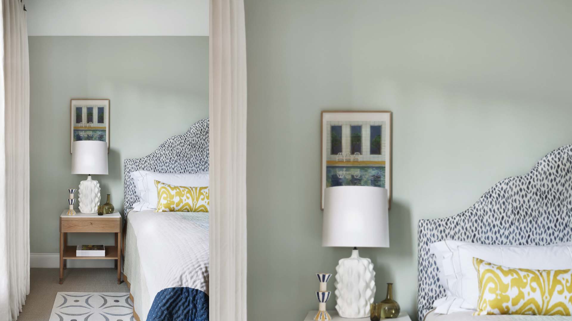A bedroom painted in light green-grey with neutral furnishings