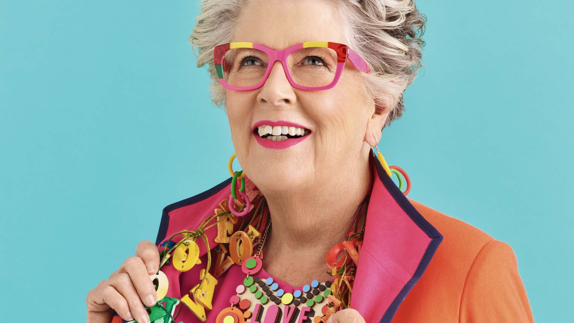 Prue Leith wearing colourful glasses and jacket