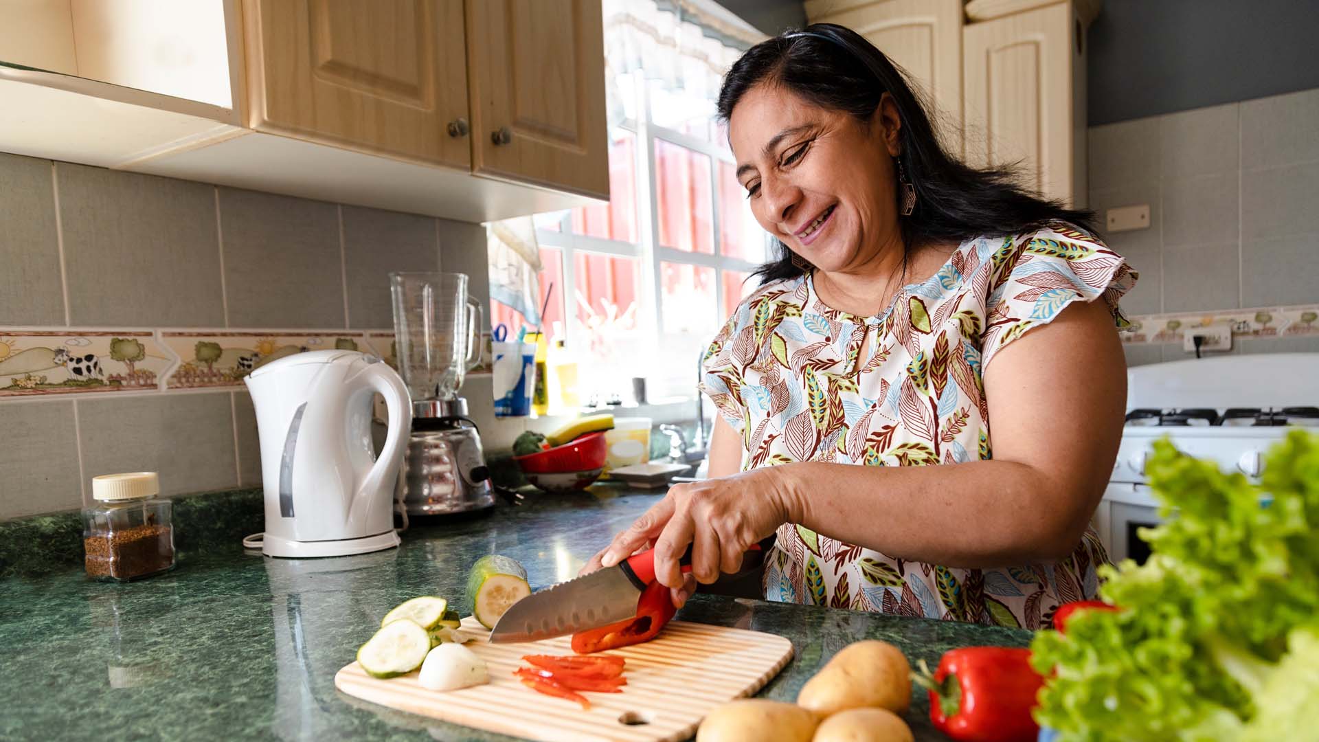 Woman chopping vegetables