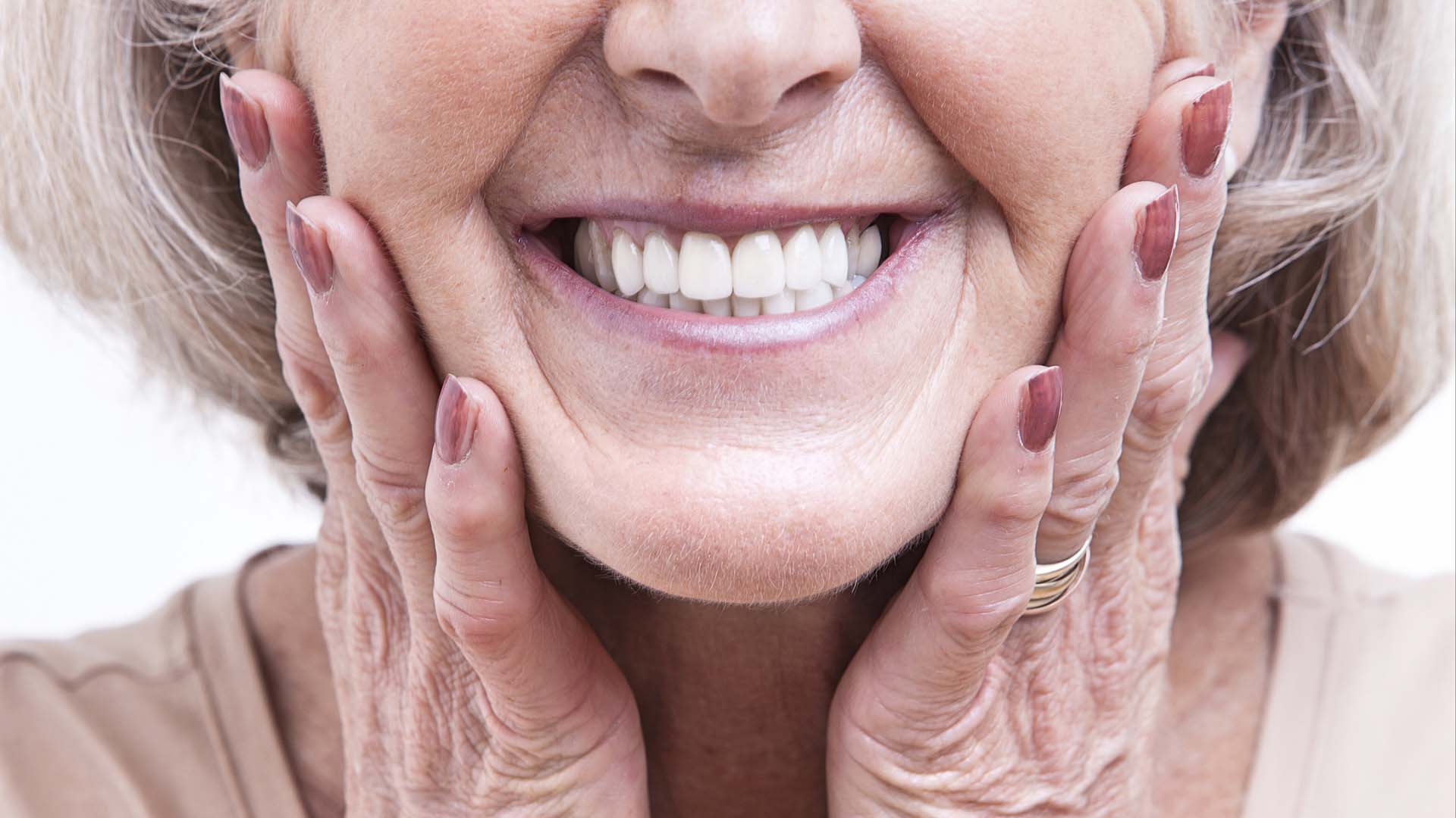 woman smiling OTT at the camera