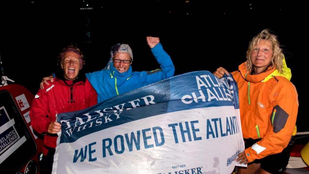 The three team mates celebrating their Atlantic crossing