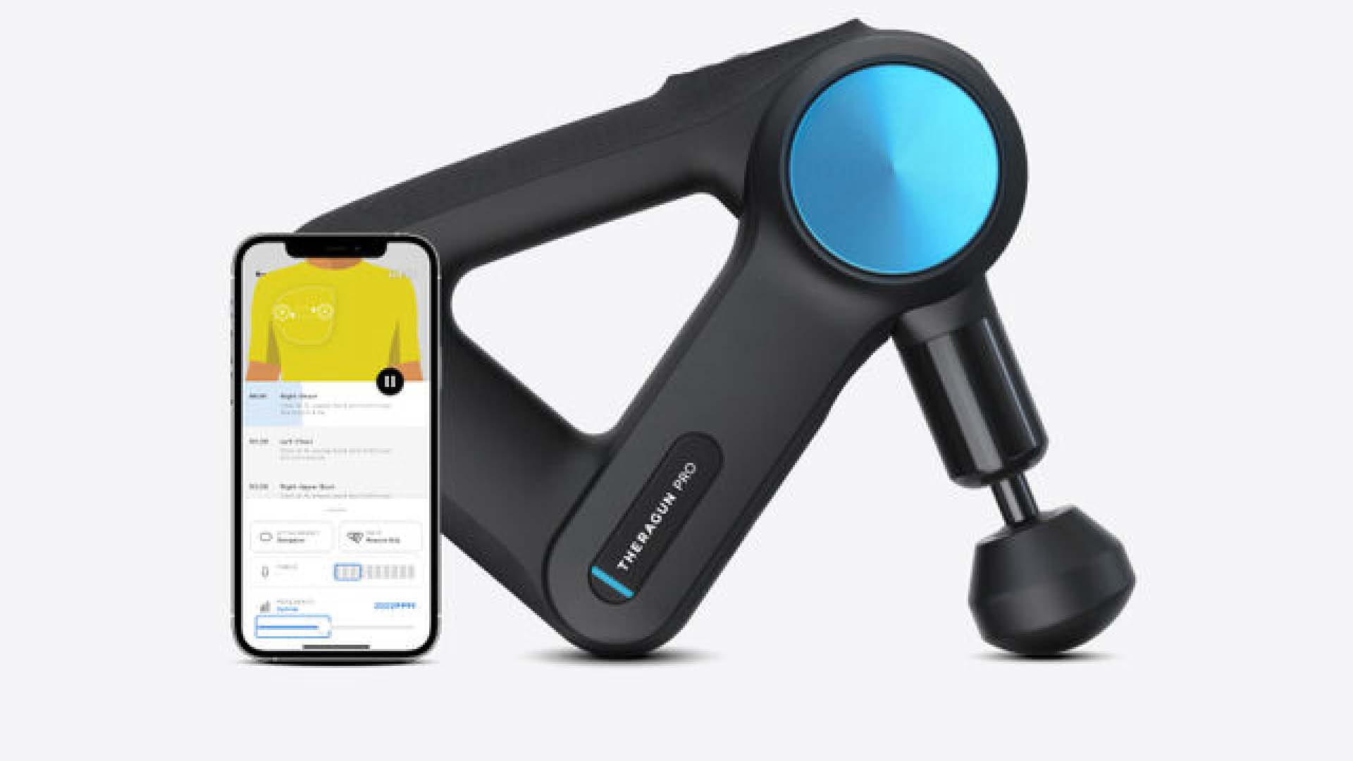 massage gun and a phone with the app up