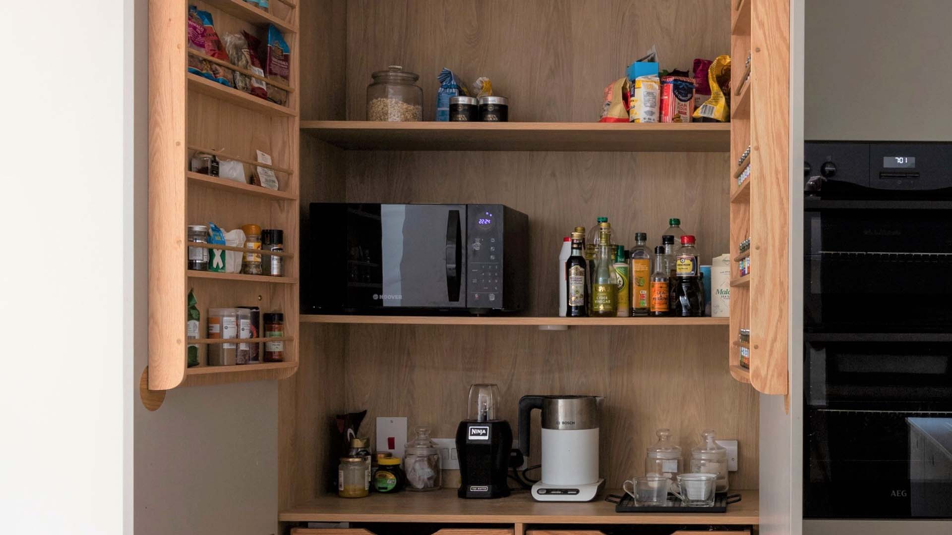 Hide away small appliances in a pantry cupboard for a more streamlined worktop. 