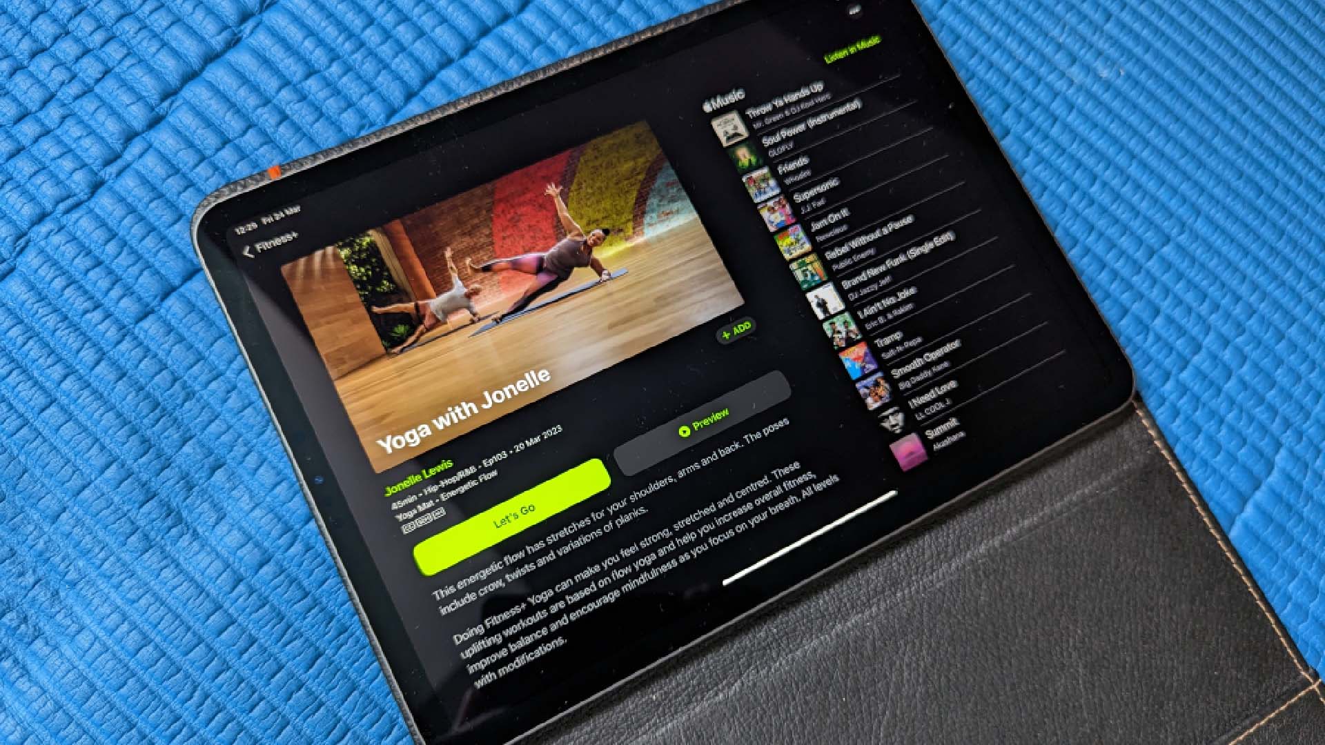 An iPad open to Apple Fitness +