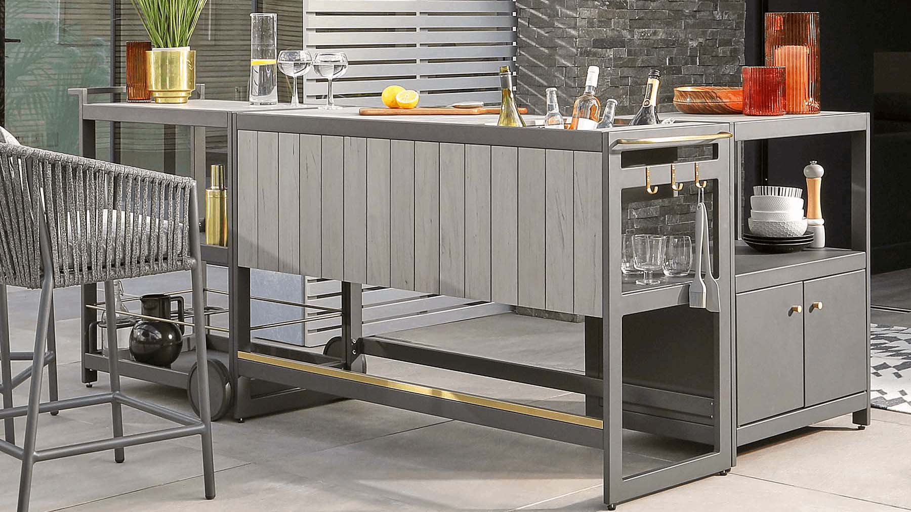 series of modular units in grey, on castors creating a corner space outdoors