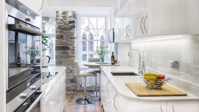 A white galley kitchen