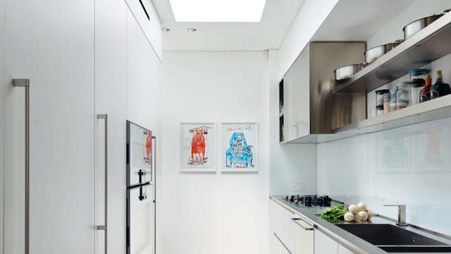 a white galley kitchen