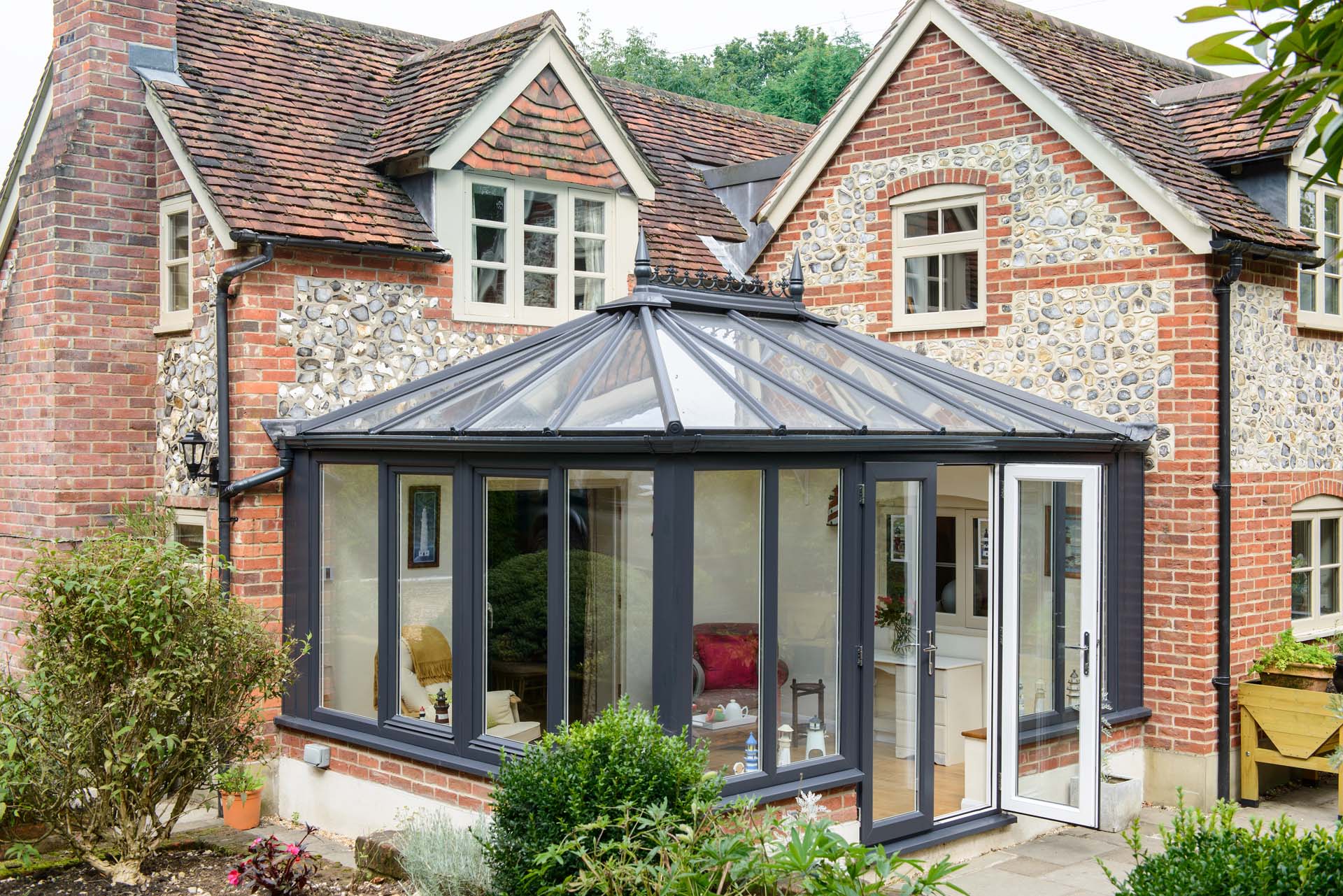 A conservatory with a roof designed to reflect heat