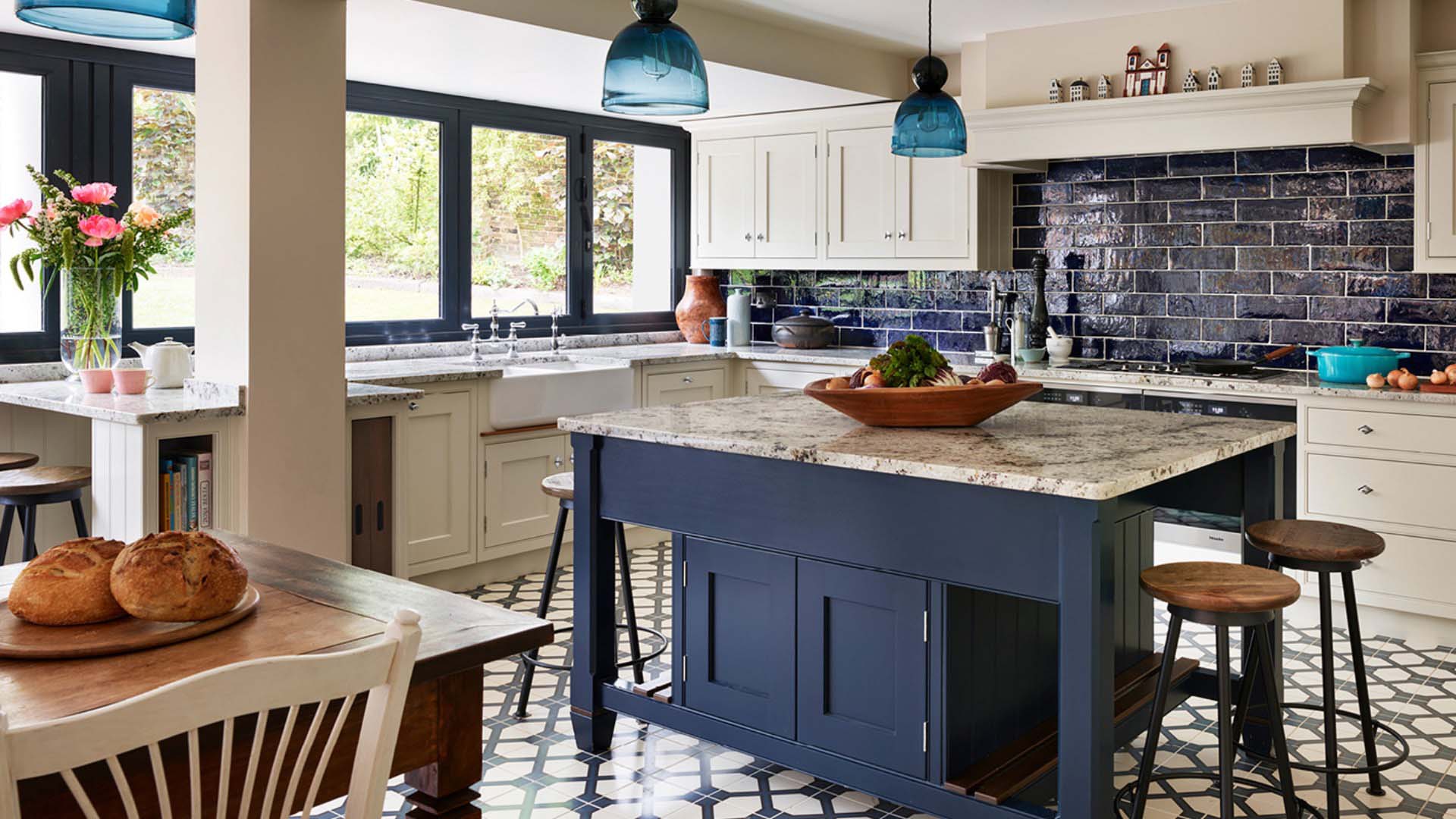 A bold and playful cream and navy kitchen by Martin Moore