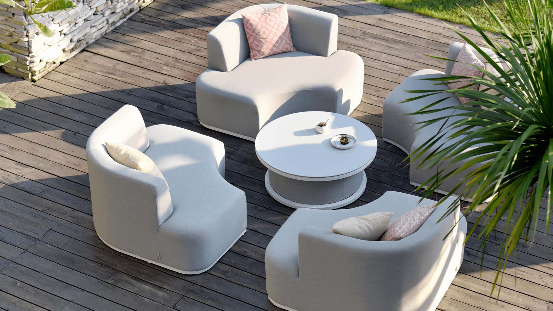 Circular light garden furniture set on top of a wood deck