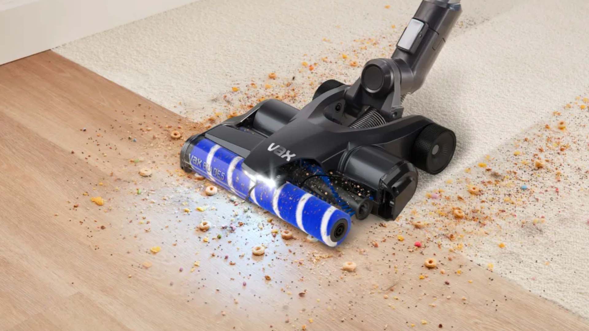 Seeing the Vax’s VersaClean Technology in action to suck up crumbs