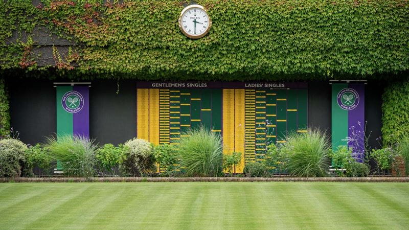 View of the Order of Play boards showing last year’s winners on the exterior of Centre Court at the All England Lawn Tennis Club on a stormy Saturday 27th June 2020 the weekend before The Championships were due to start on Monday 29th June 2020. The grounds are quiet and still, normally they would be busy and bustling with players practising and groundsmen and staff making the final detailed preparations.

The Championships have been cancelled due to the Coronavirus pandemic. Credit: AELTC/Bob Martin