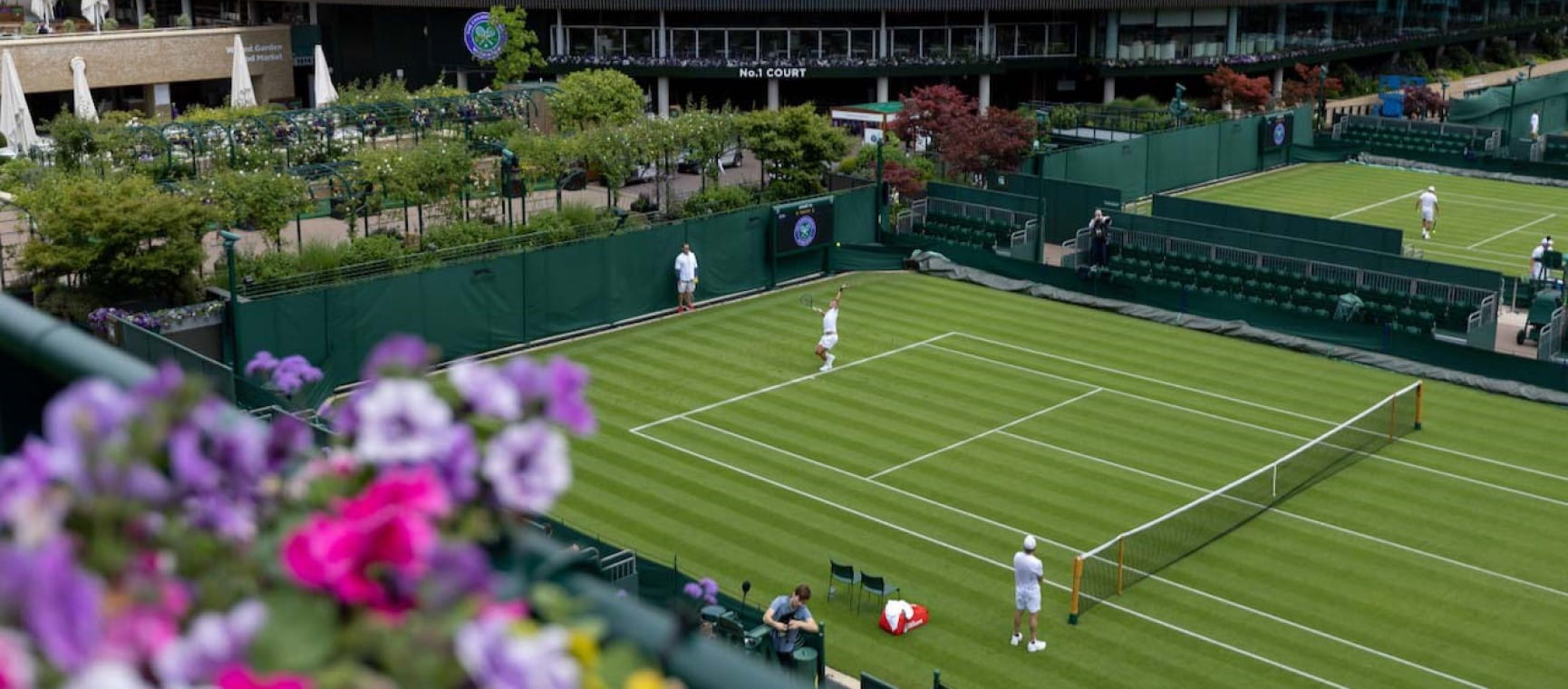 Players practice on the outside courts at The Championships 2022. Held at The All England Lawn Tennis Club, Wimbledon. Day -3 Friday 24/06/2022. Credit: AELTC/Jed Jacobsohn.