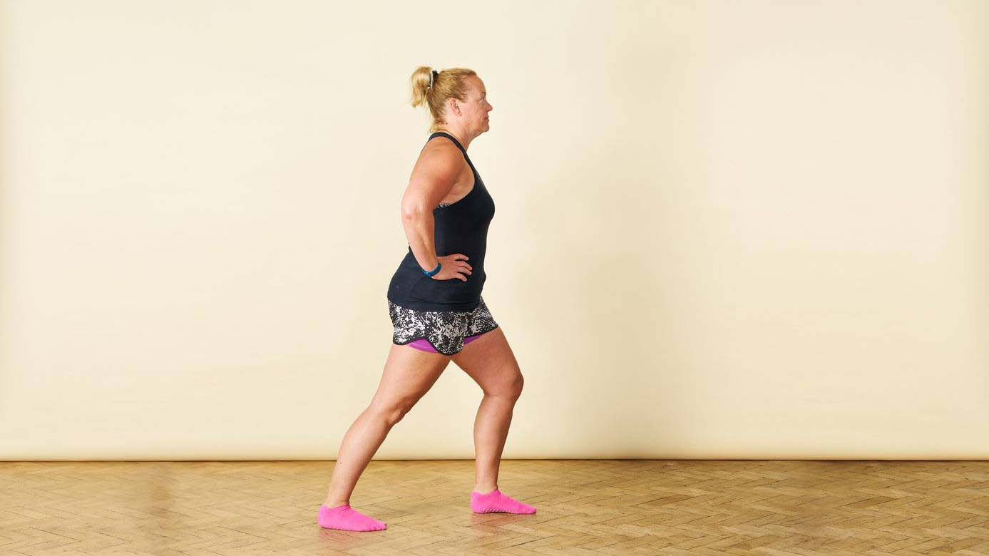 woman doing a calf stretch