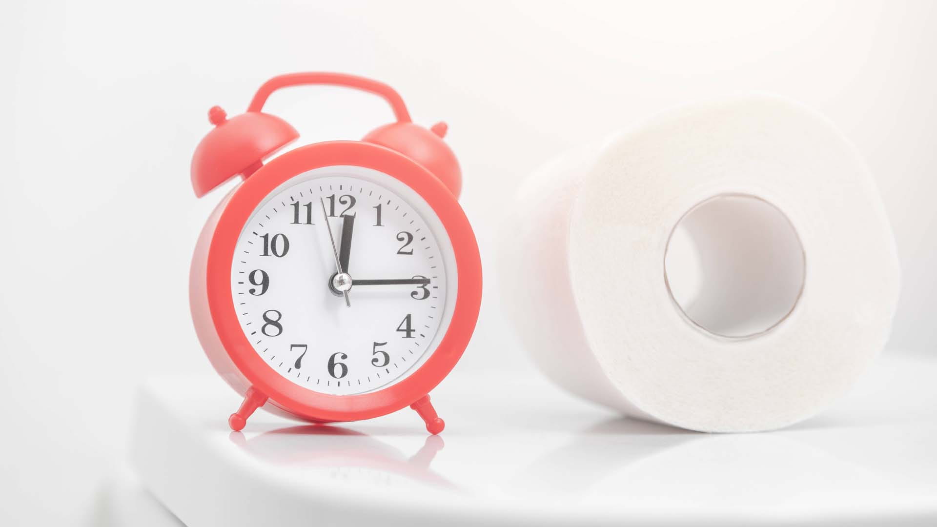 Clock and toilet paper
