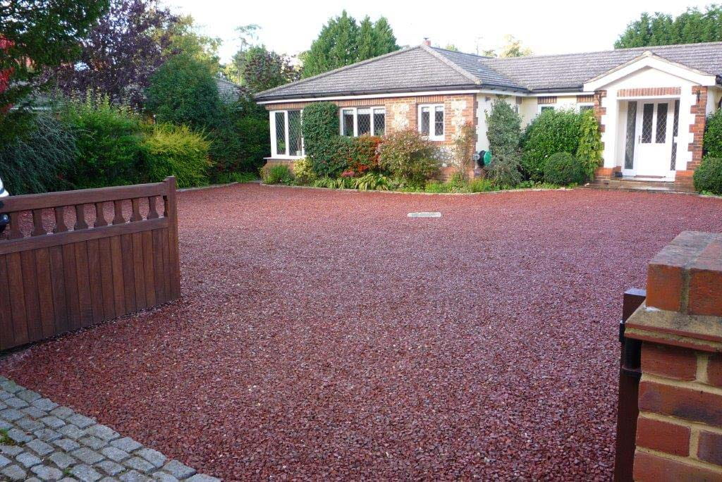 A red coloured granite driveway