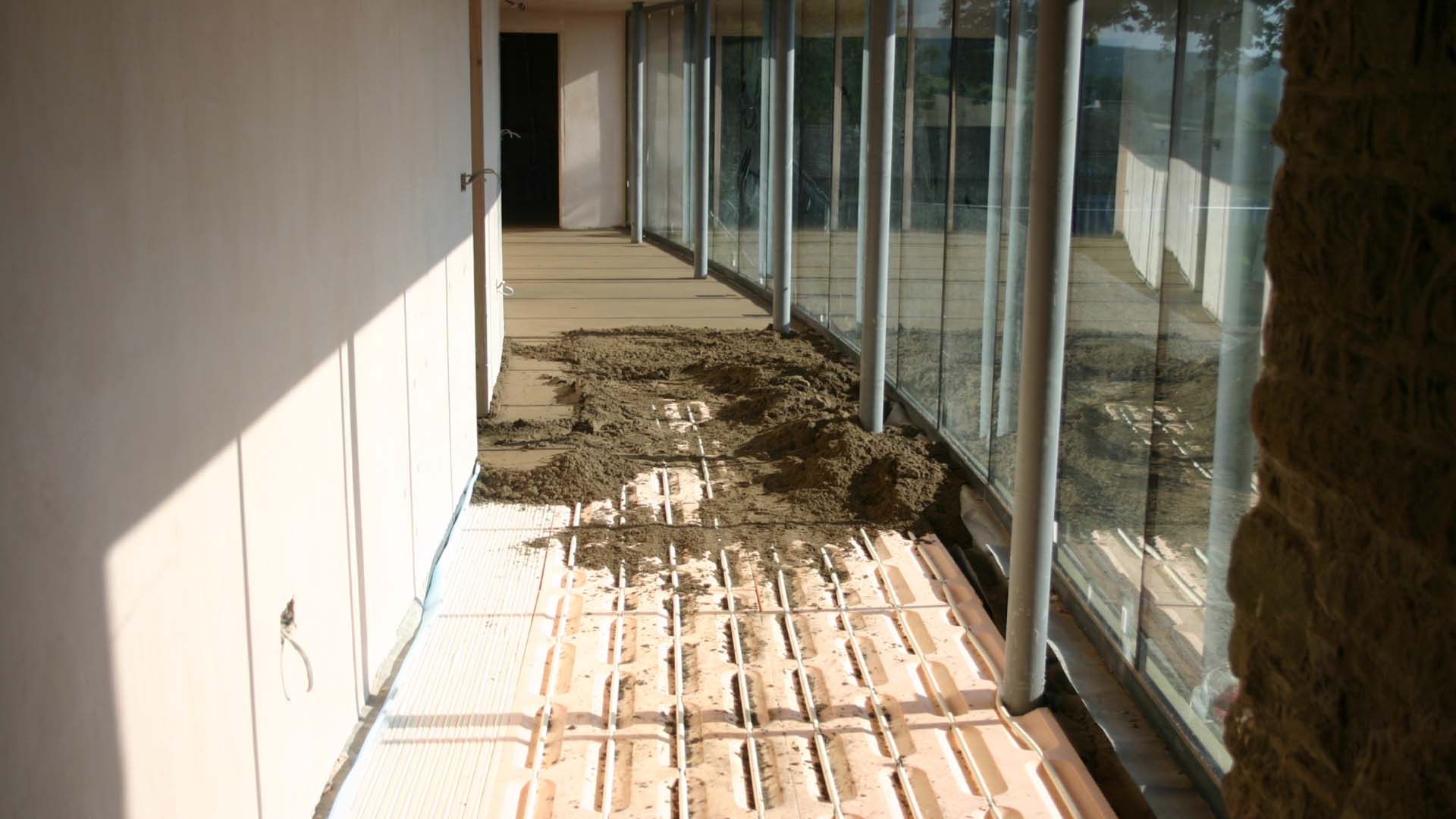 A corridor in the process of being screed
