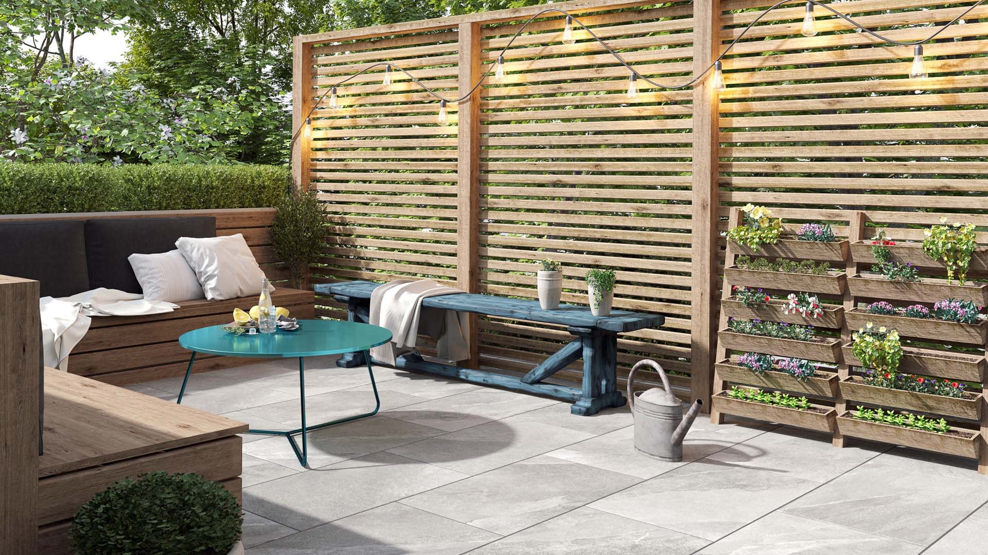 Garden patio with side fence and wood benches on top of a porcelain tiles floor