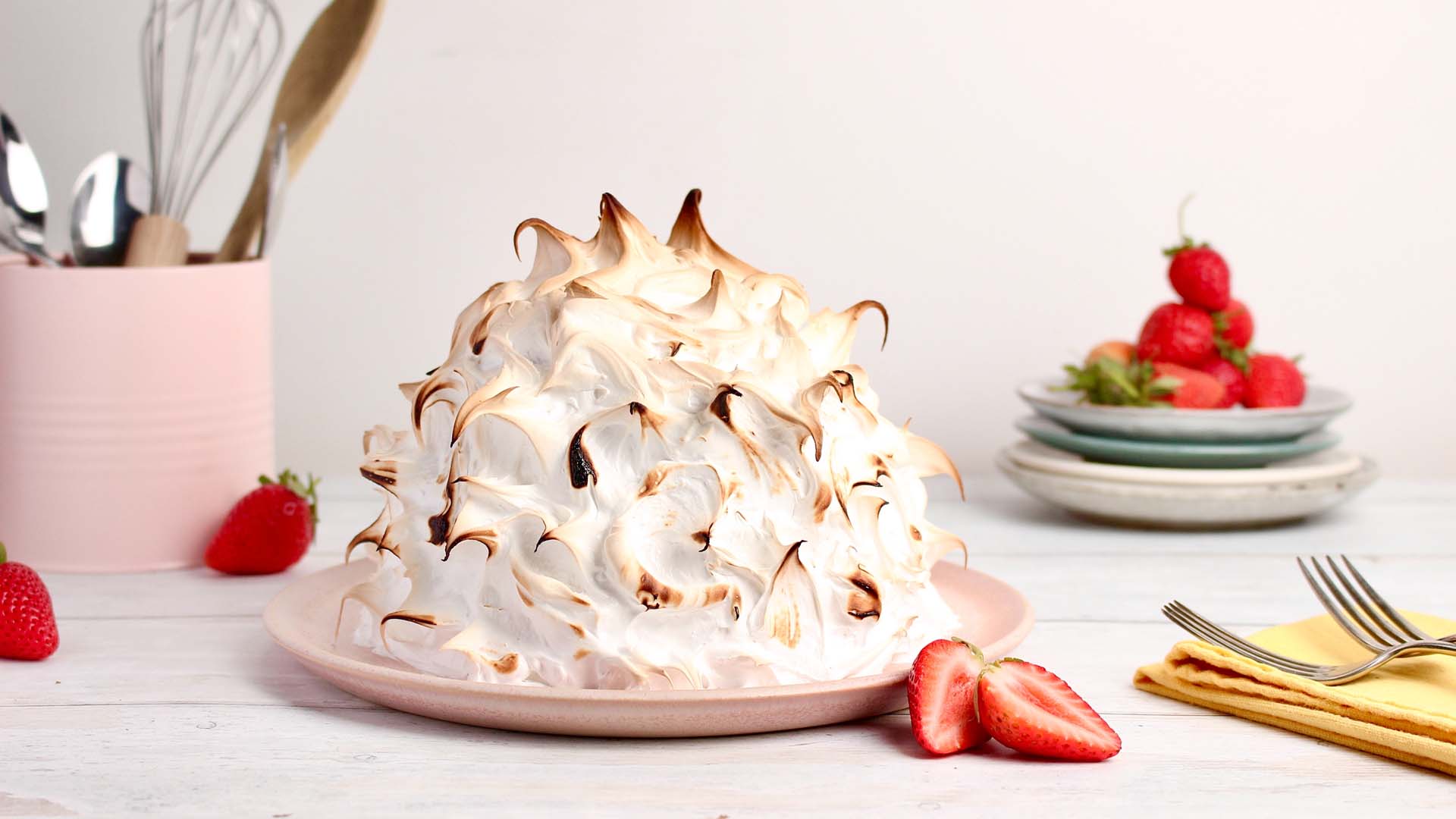 A baked alaska with strawberries