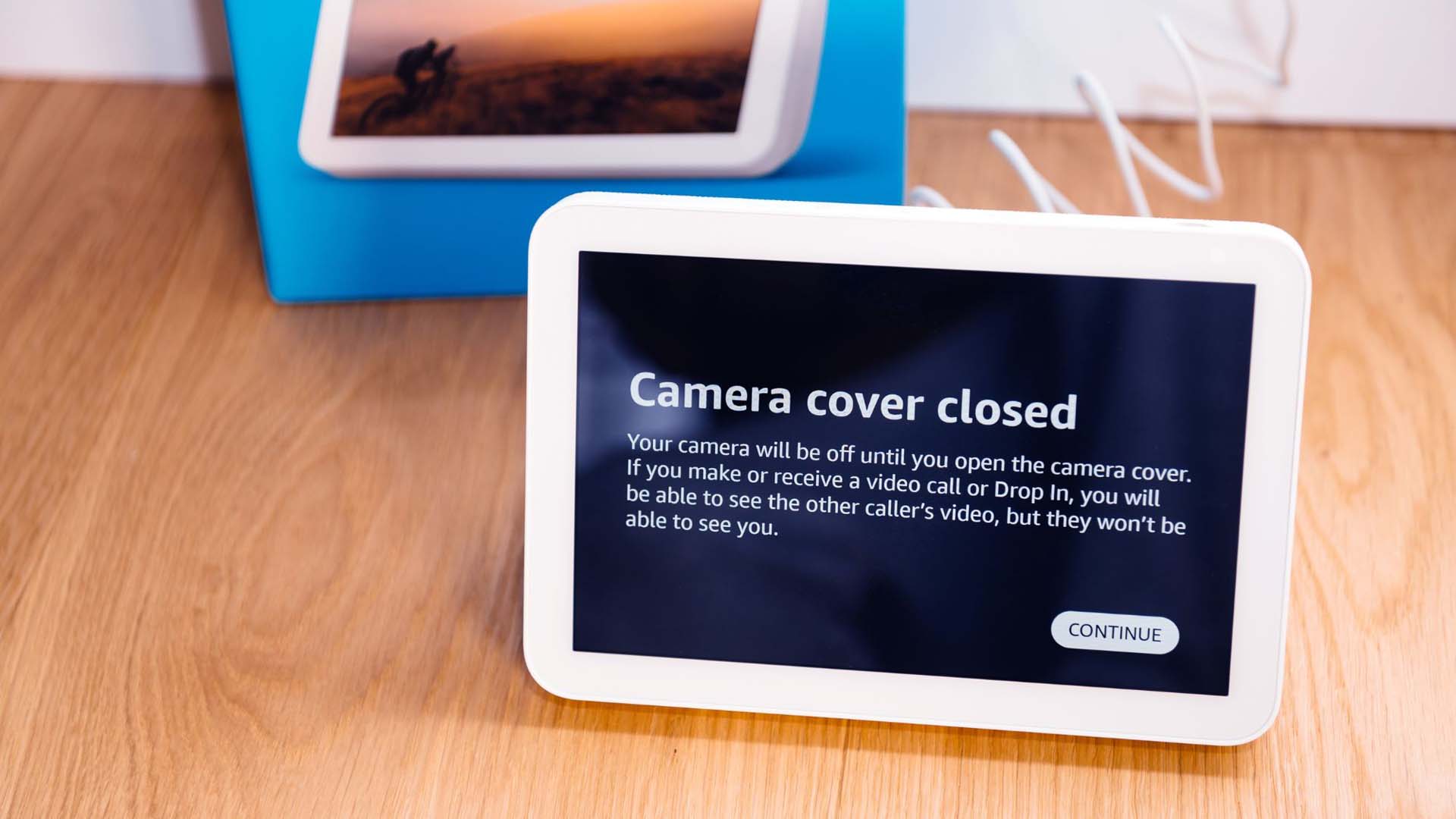An Amazon Echo Show device showing the message 'camera cover closed'