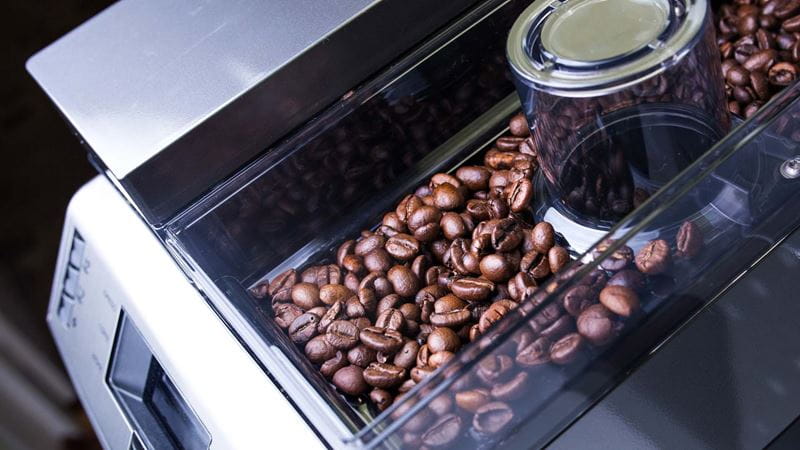 Coffee beans in the hopper of a coffee machine