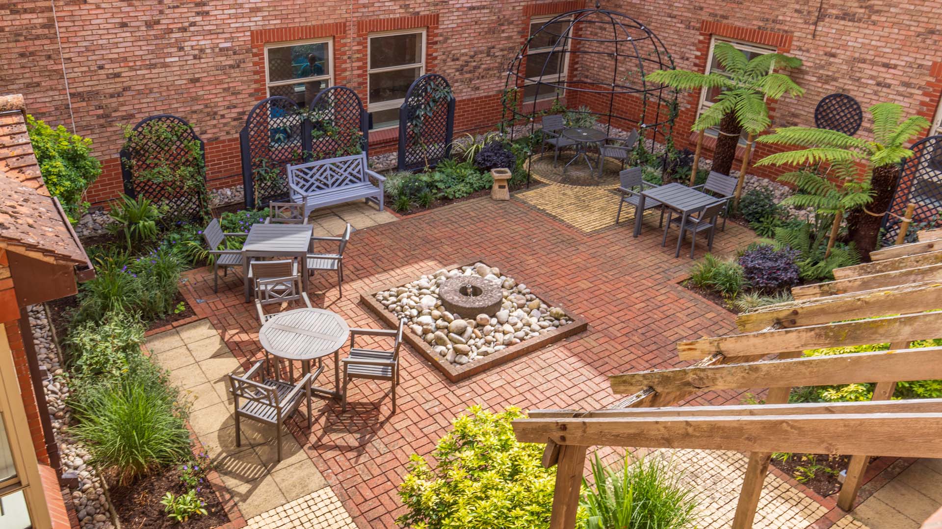 sunshine basking a courtyard but with a few shady spots