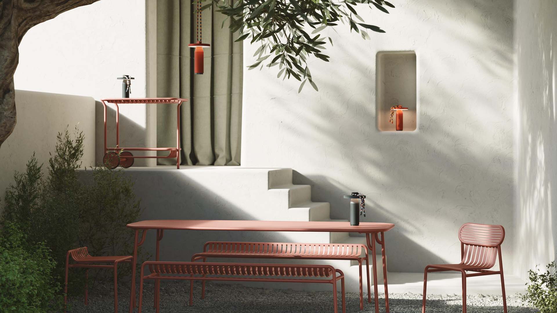 Outside wall painted white to brighten it up for the table and chairs 