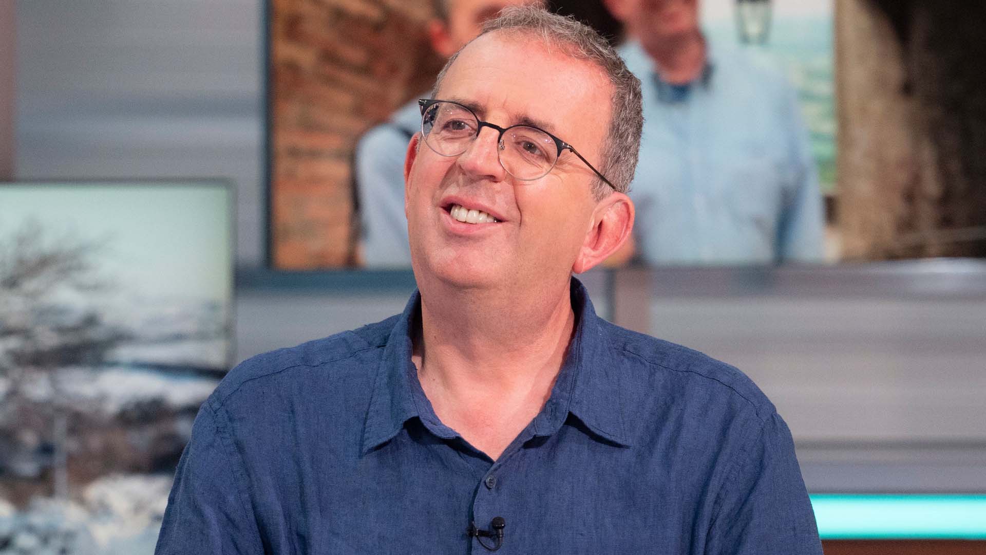 A head and shoulders image of vicar turned author Richard Coles