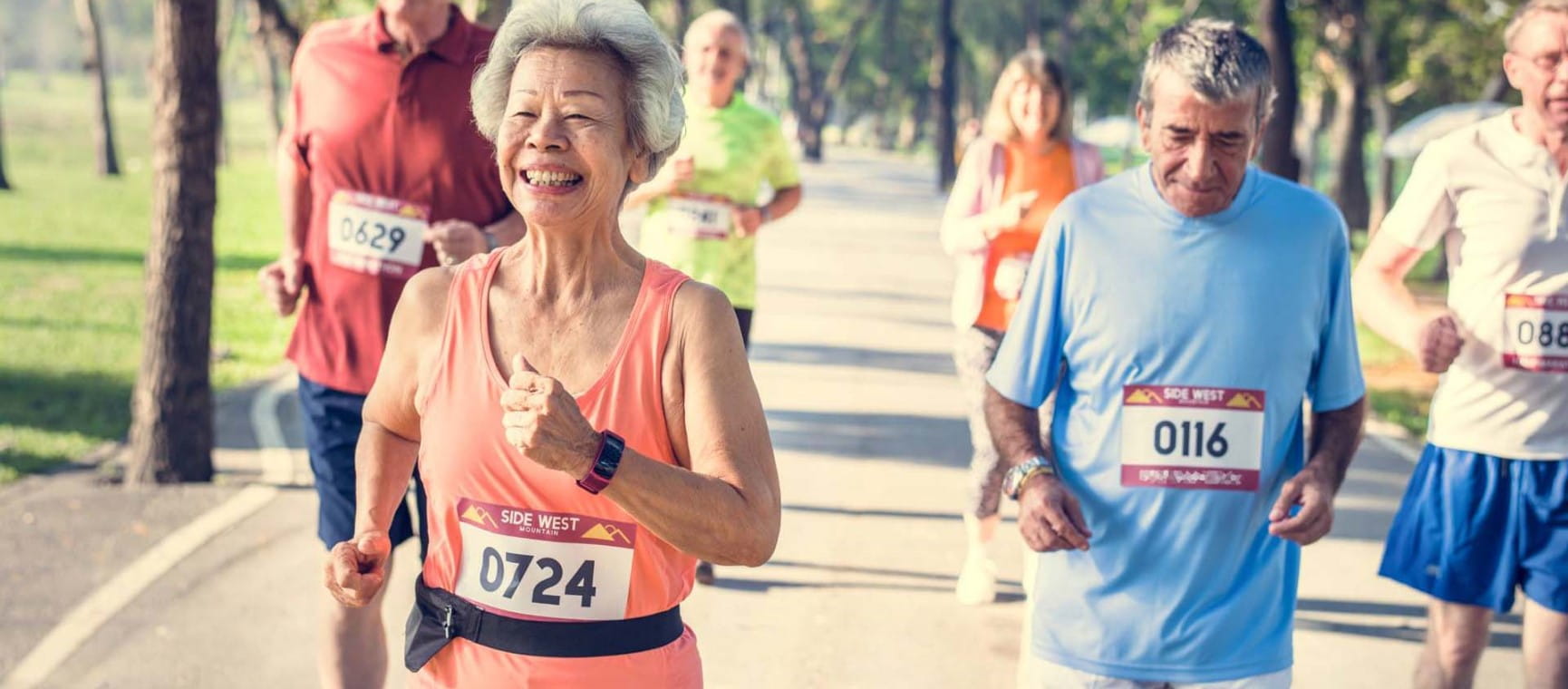 An older lady looks happy as she competes in a race |  Shutterstock/Rawpixel.com