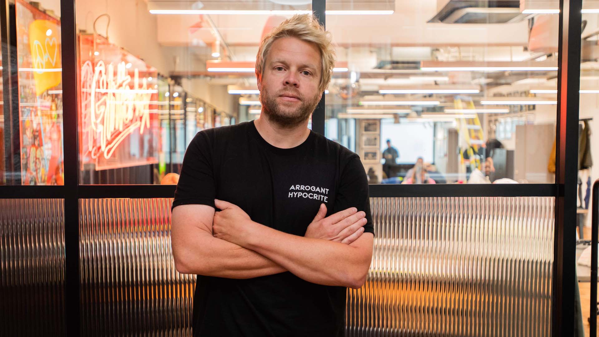 James Kirkham standing with crossed arms