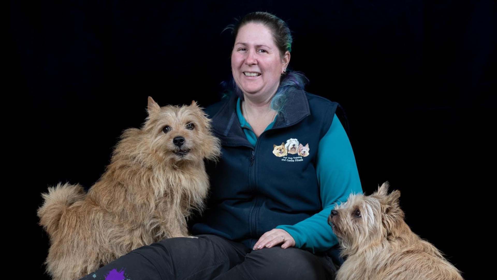 Dog trainer Joe Nutkins with two dogs