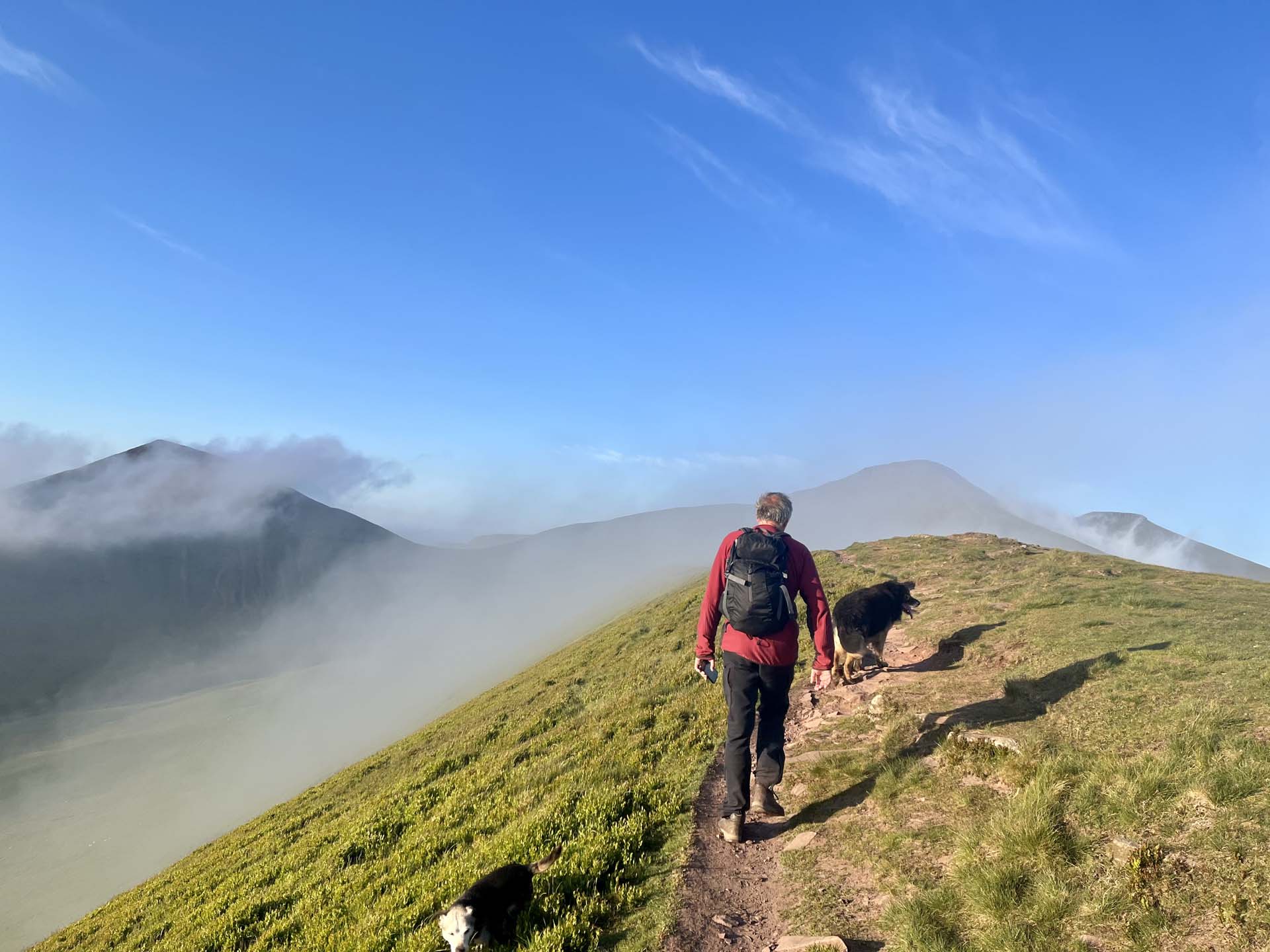 One person walking up a steep hill