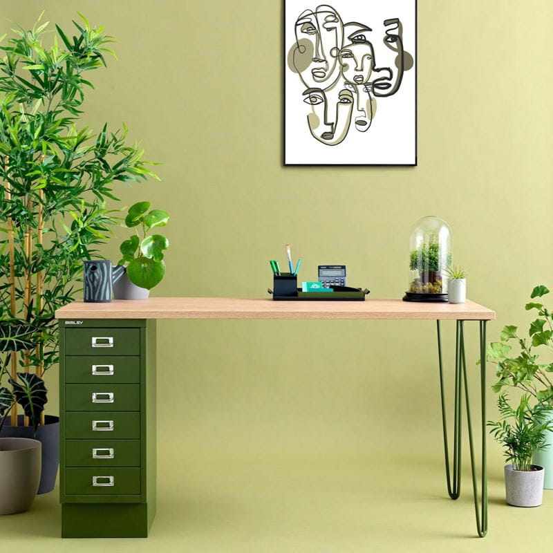 green office with a sleek natural desk setup