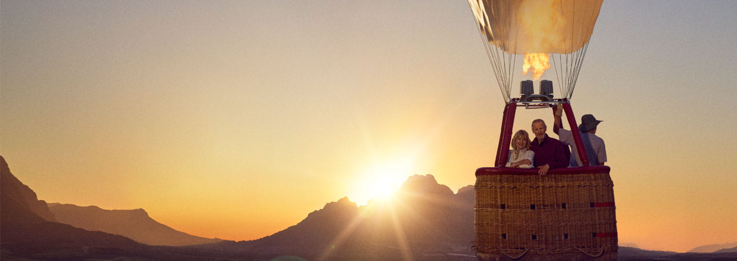 Hot air balloon rising at sunrise with Which Best Buy Logo