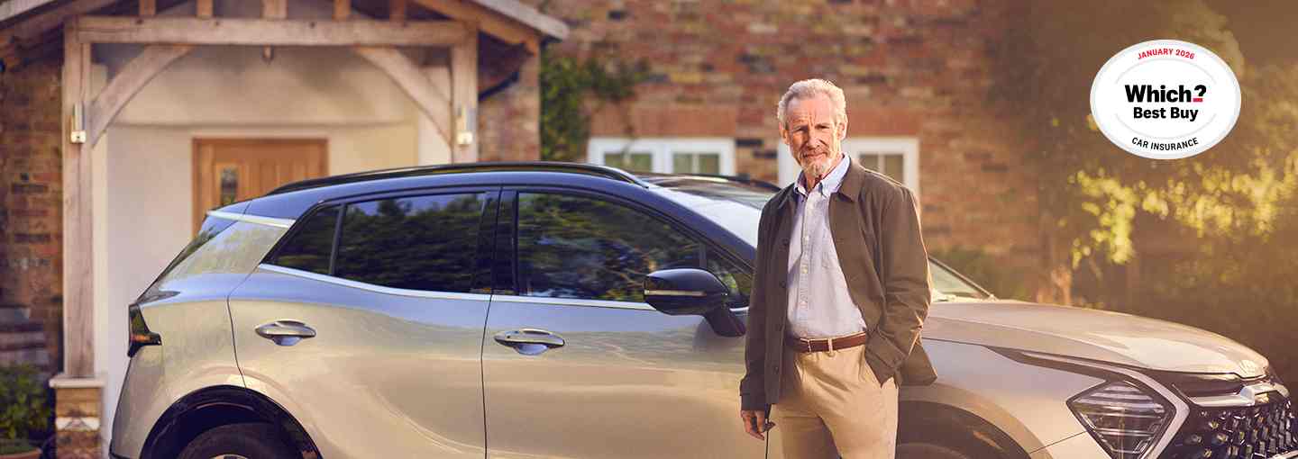 An older man standing beside a modern SUV parked outside a brick house, with a ‘Which? Best Buy’ award badge displayed in the top-right corner.