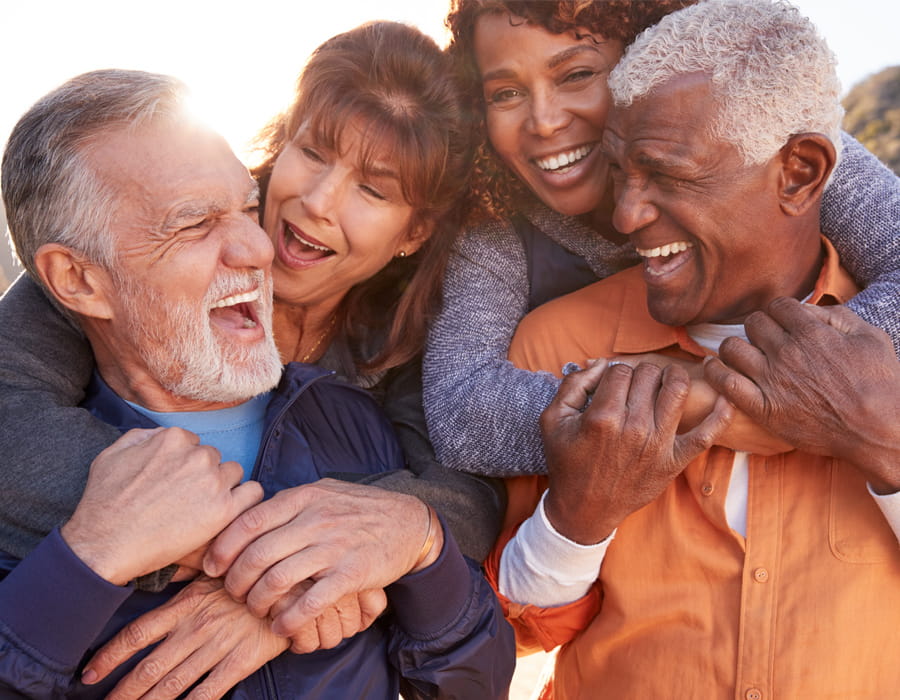 Two couples laughing