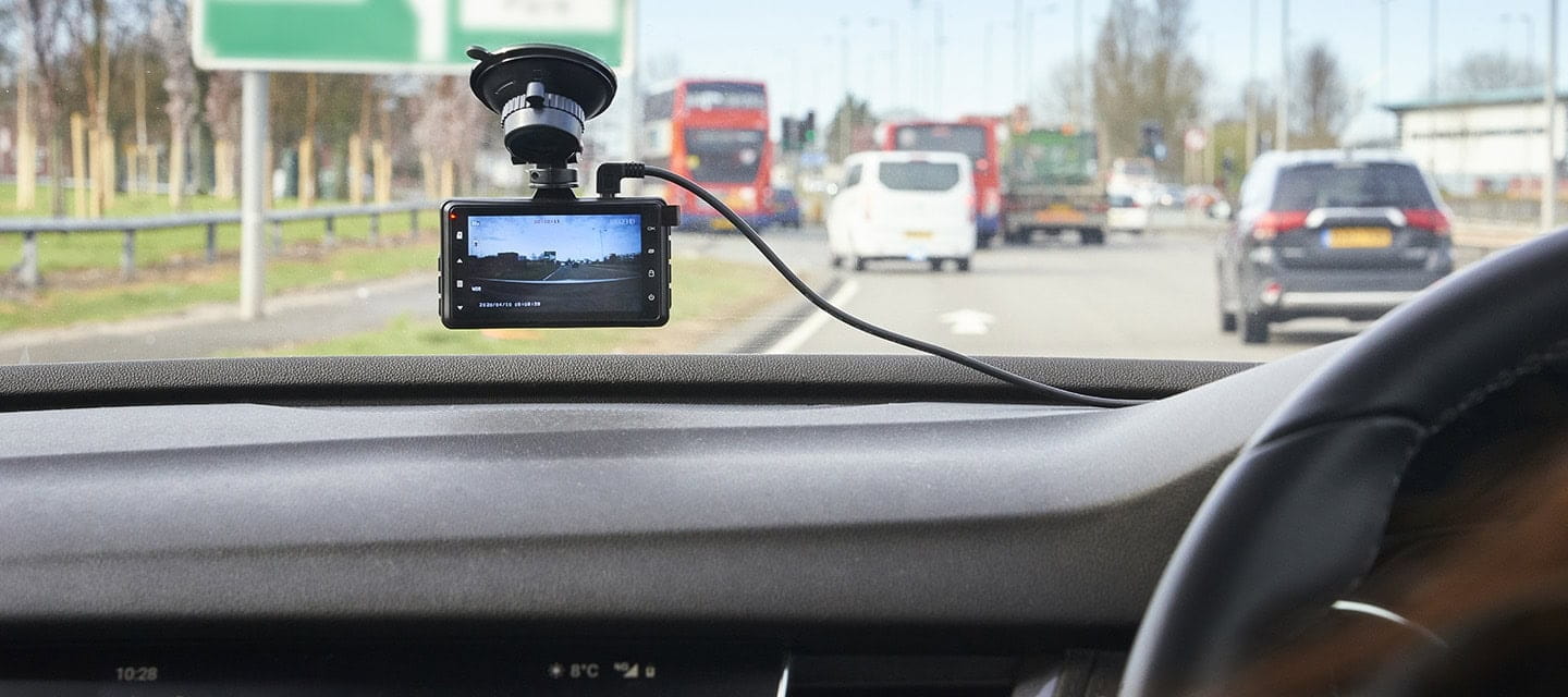 Dash cam in the windscreen of a car on it’s daily commute.