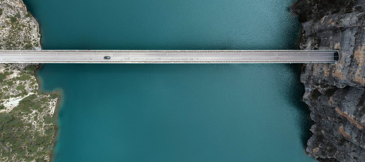 Aerial view of stunning elevated road with tunnel in the mountains of Spain.