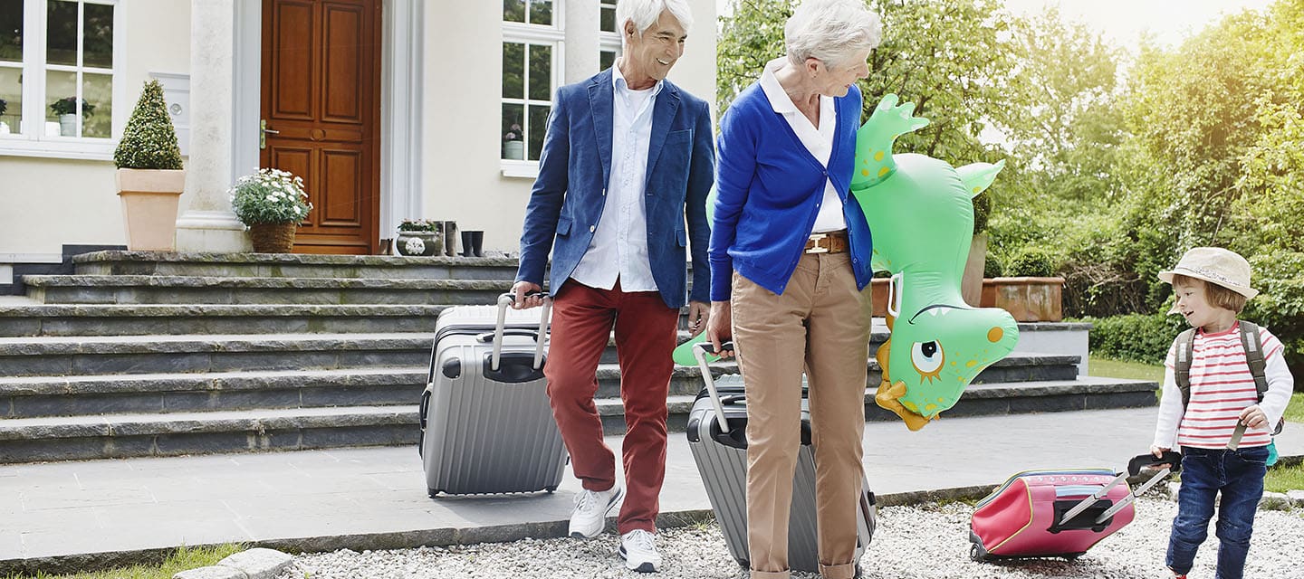 A little girl leaving home to travel with grandparents.