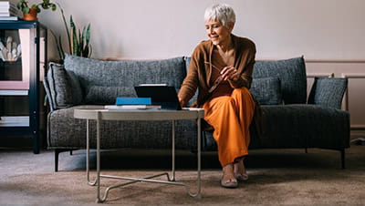 A woman at home doing some admin