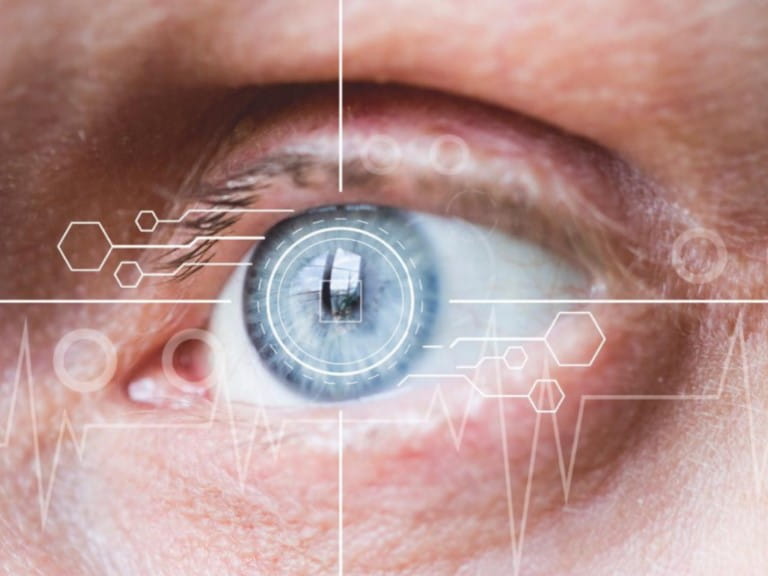 A close up on an eye with overlaid biometric graphics | Shutterstock
