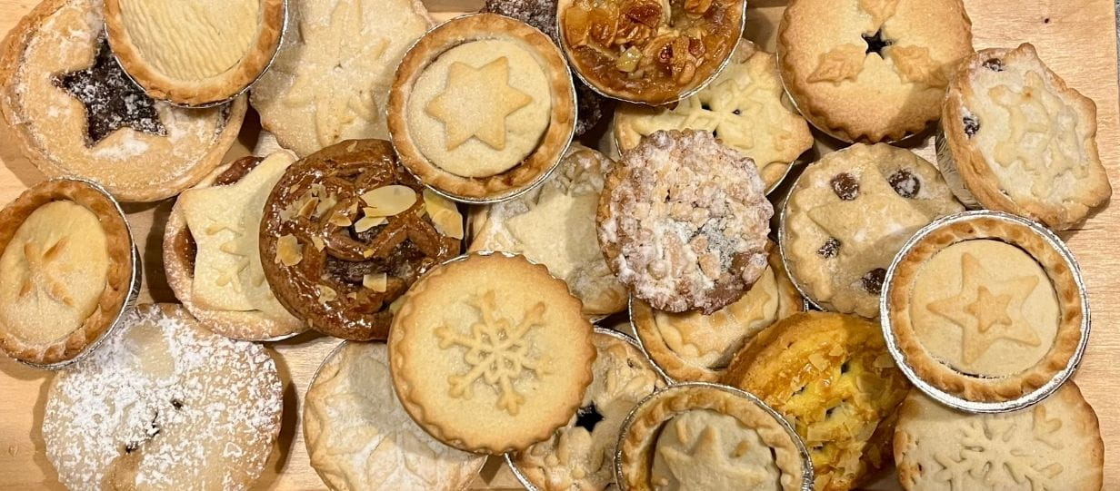 All the mince pies tested for 2025 collected on a worktop