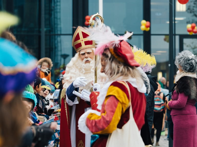 Sinterklaas with his helpers at a parade in Amsterdam