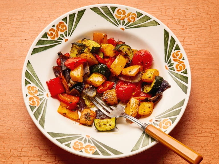 A bowl of chopped and cooked Mediterranean vegetables