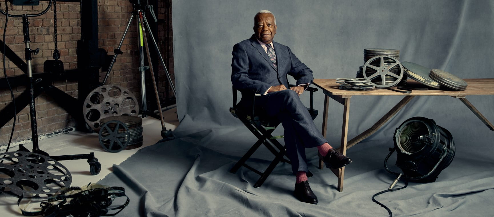 Sir Trevor McDonald behind the scenes at a photoshoot | Saga