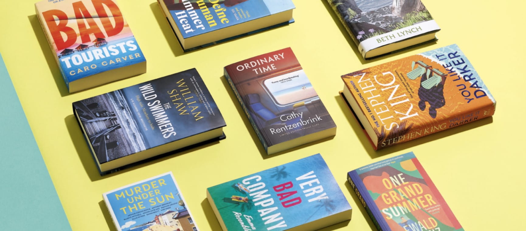 A flat lay of books chosen for taking on holiday | Saga