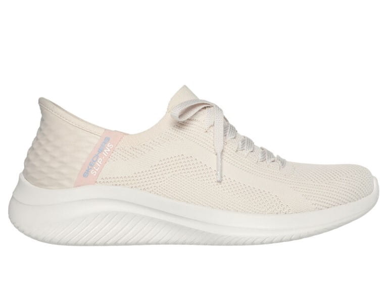 A white slip on trainer shoe by Skechers