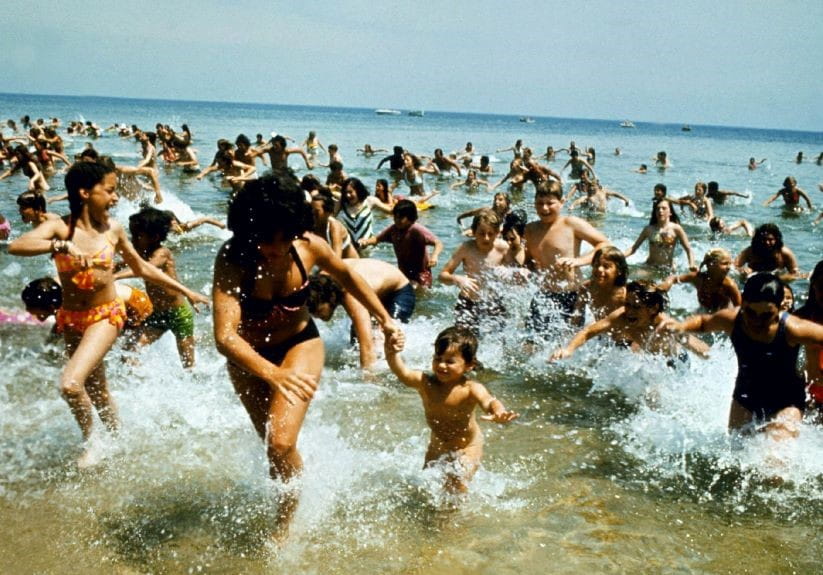 Scene from the film of everyone in the sea running away