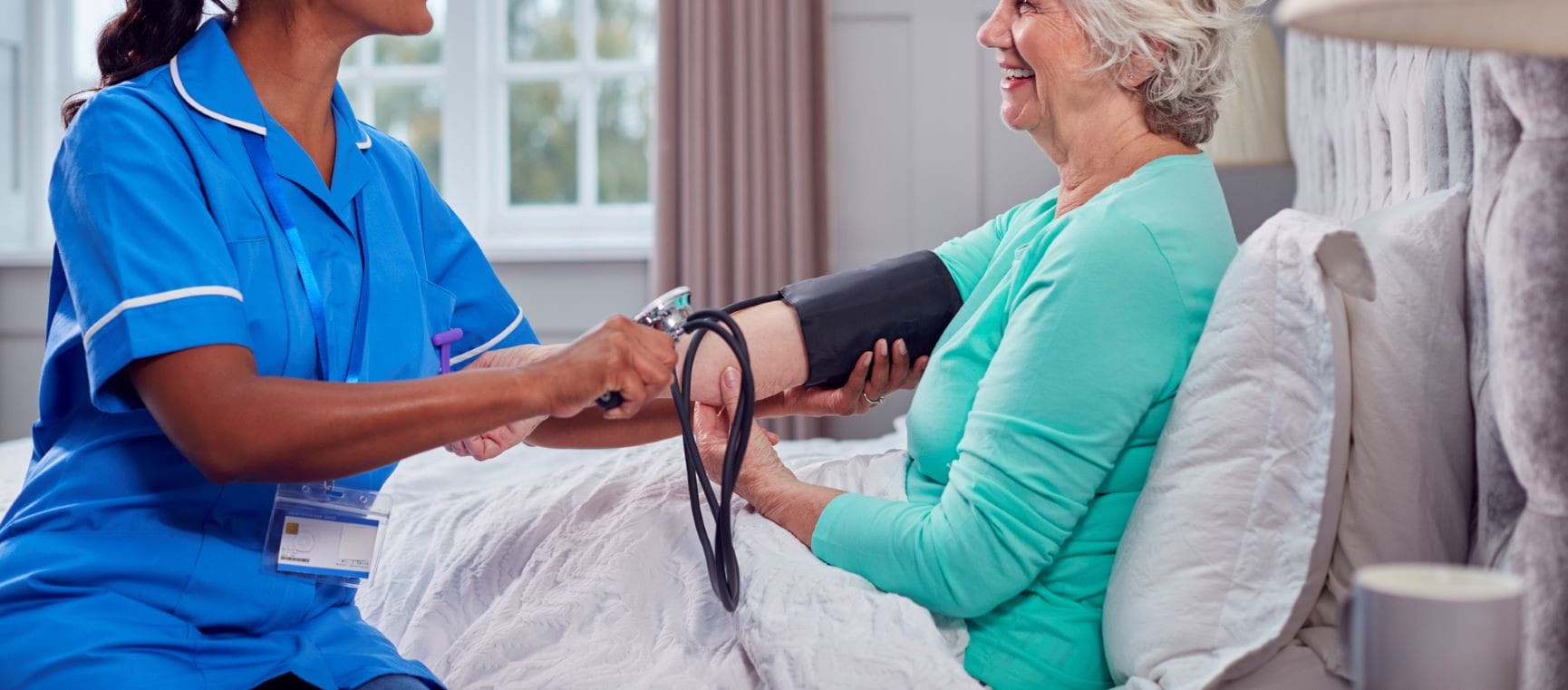 woman getting her blood pressure taken