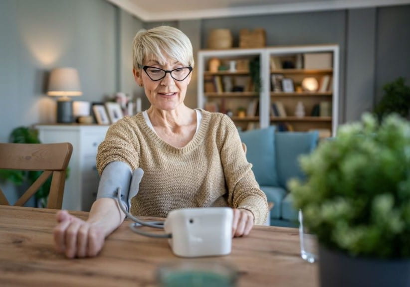 woman taking her blood pressure
